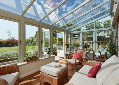 pebble grey lean to conservatory looking out over the garden Hutchings4293