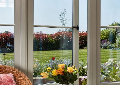 pebble grey timber casement window in lean to conservatory Hutchings4325